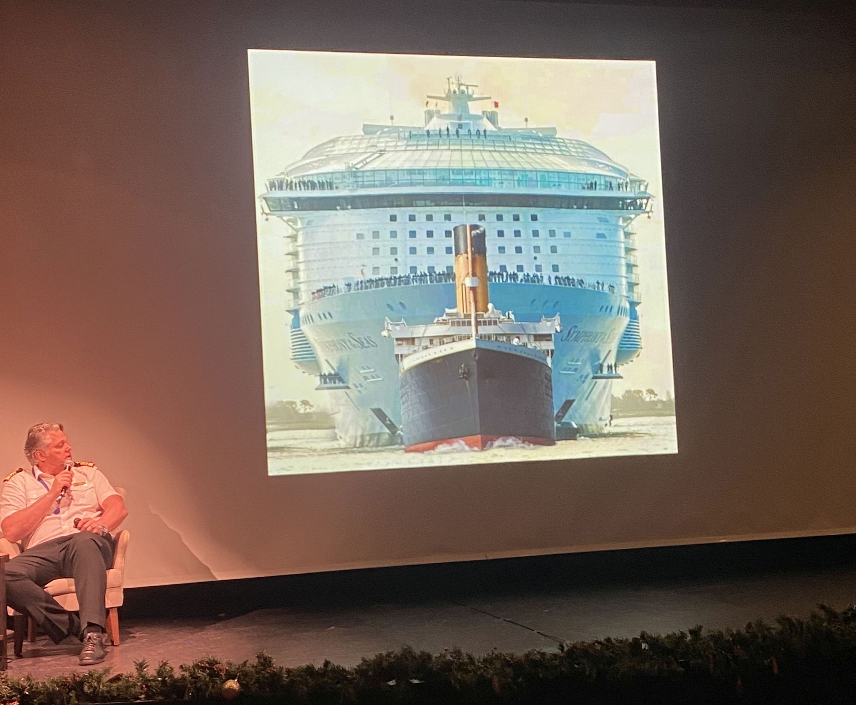 Captain Darin Bowland gave a fasinating talk at the end of the cruise and answered questions. This slide shows RCCLs latest megaliner v Titanic!