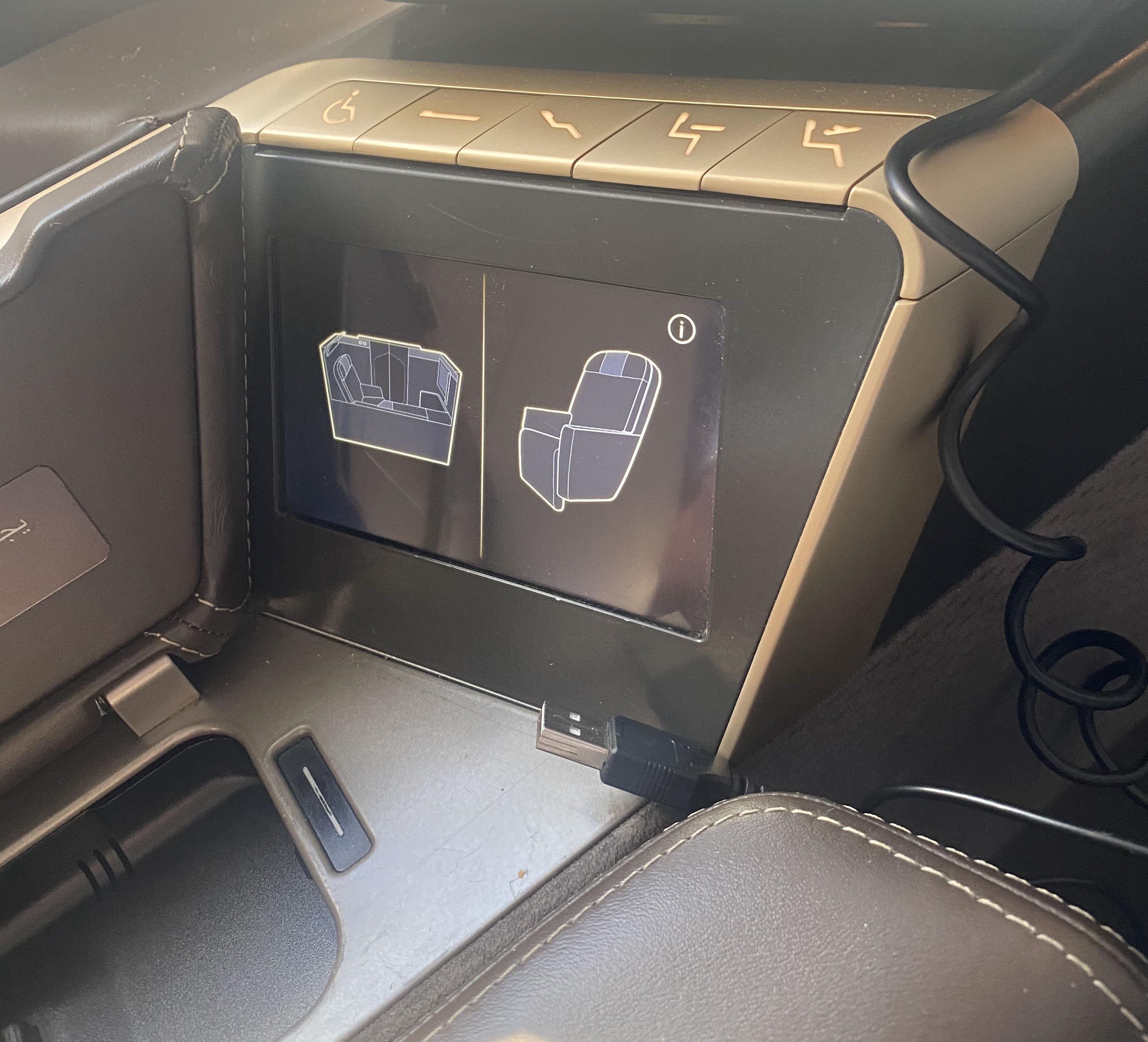 Seat controls in First.